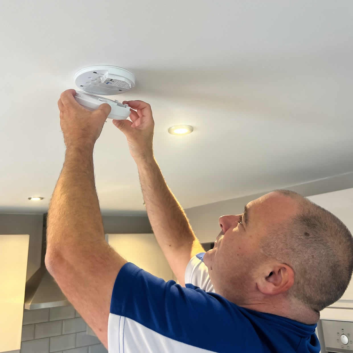 Smoke alarm providing fire safety protection in a Woking home